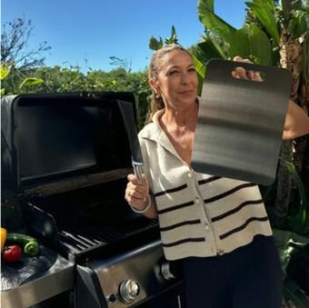 Sara holding her Katori titanium board